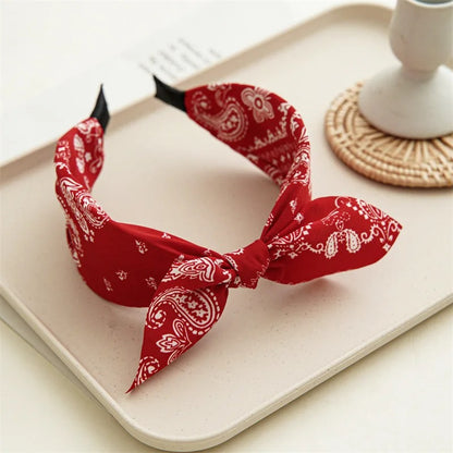 Serre tete rouge et blanc